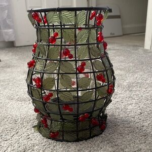 Decorative pillar holder . Leaves with red berries